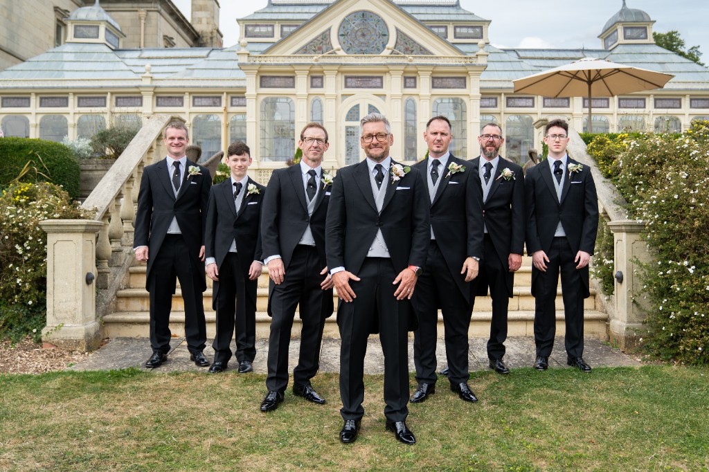 Groomsmen in black morning suits with grey waistcoats, hired from Scotney’s of London Road