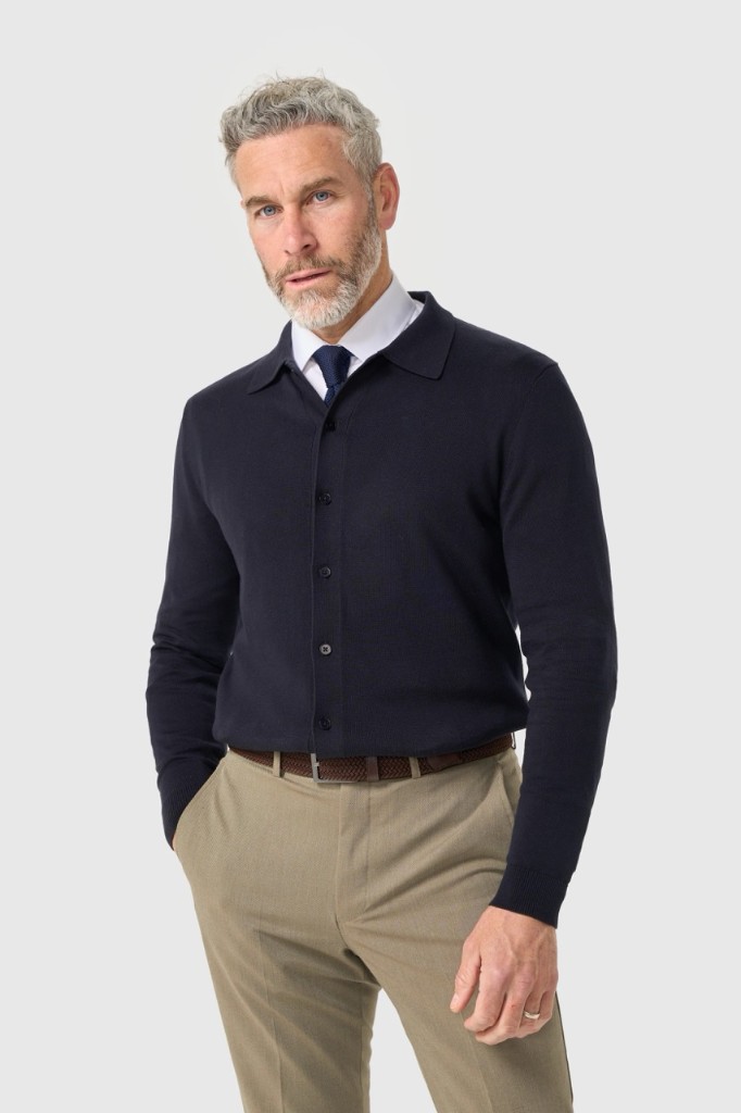 Cavani navy long-sleeve knitted polo worn with a shirt and tie