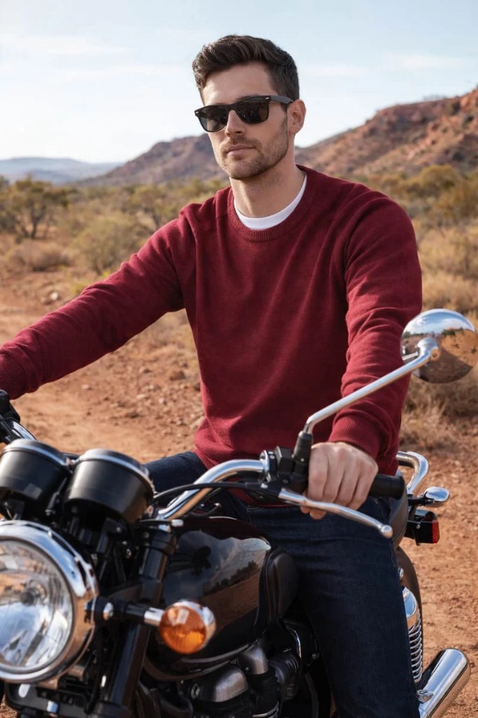 Man on a motorbike wearing a burgundy DG's Drifter crew neck jumper over a white T-shirt